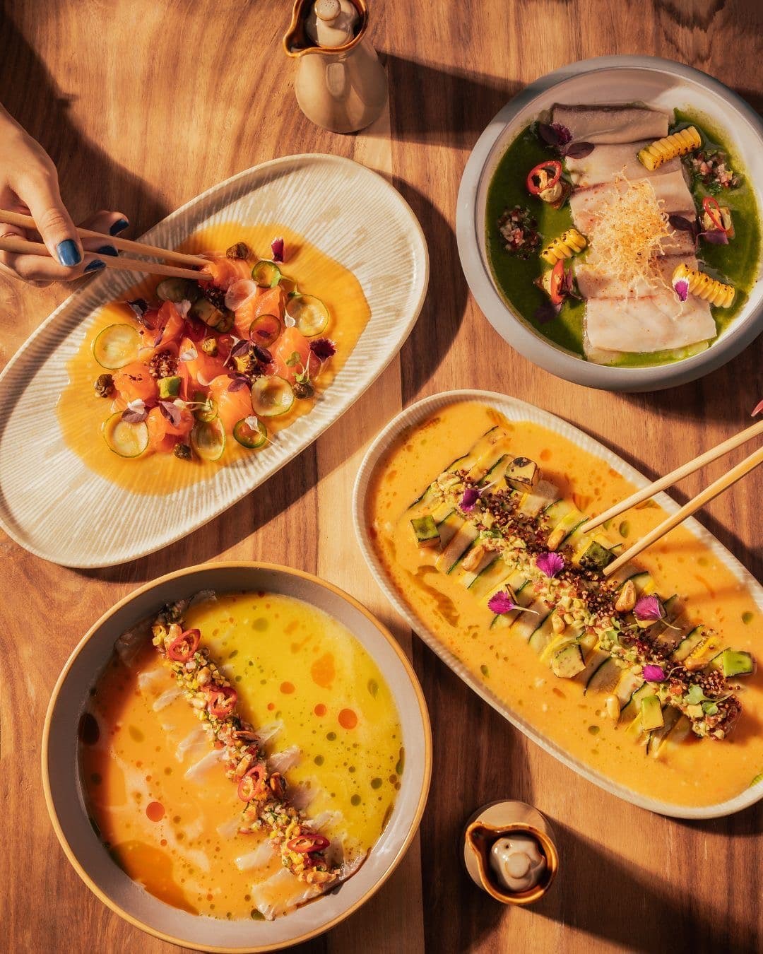 Chef preparing Peruvian Japanese fusion dish